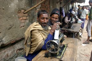 Bangladesh men smiling - Nir Nussbaum