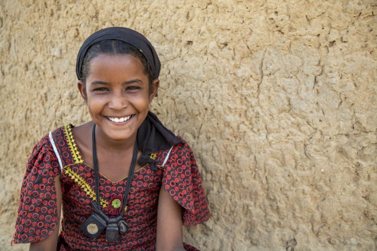 A portrait of a chadian girl in a village.